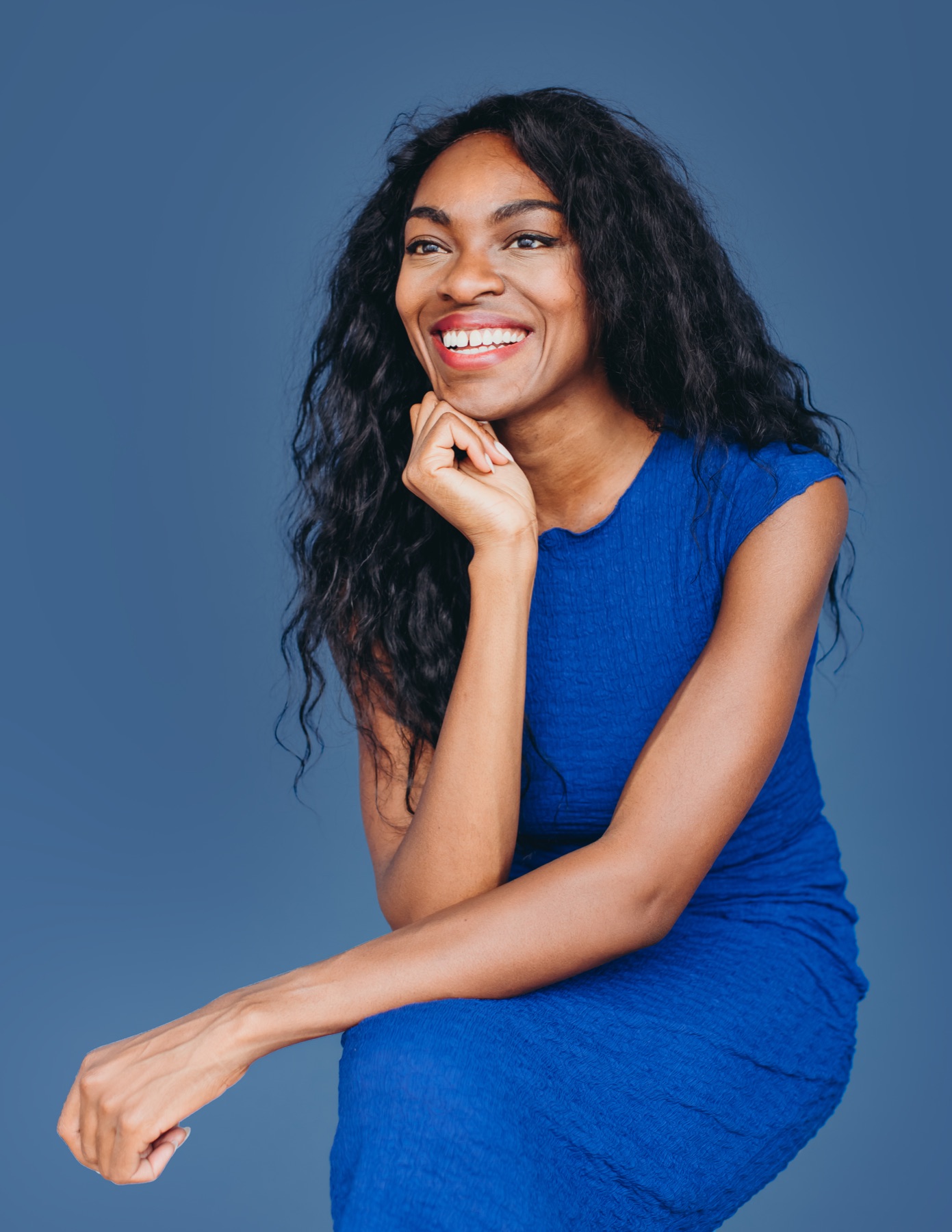 Deborah Choi smiling in a blue dress